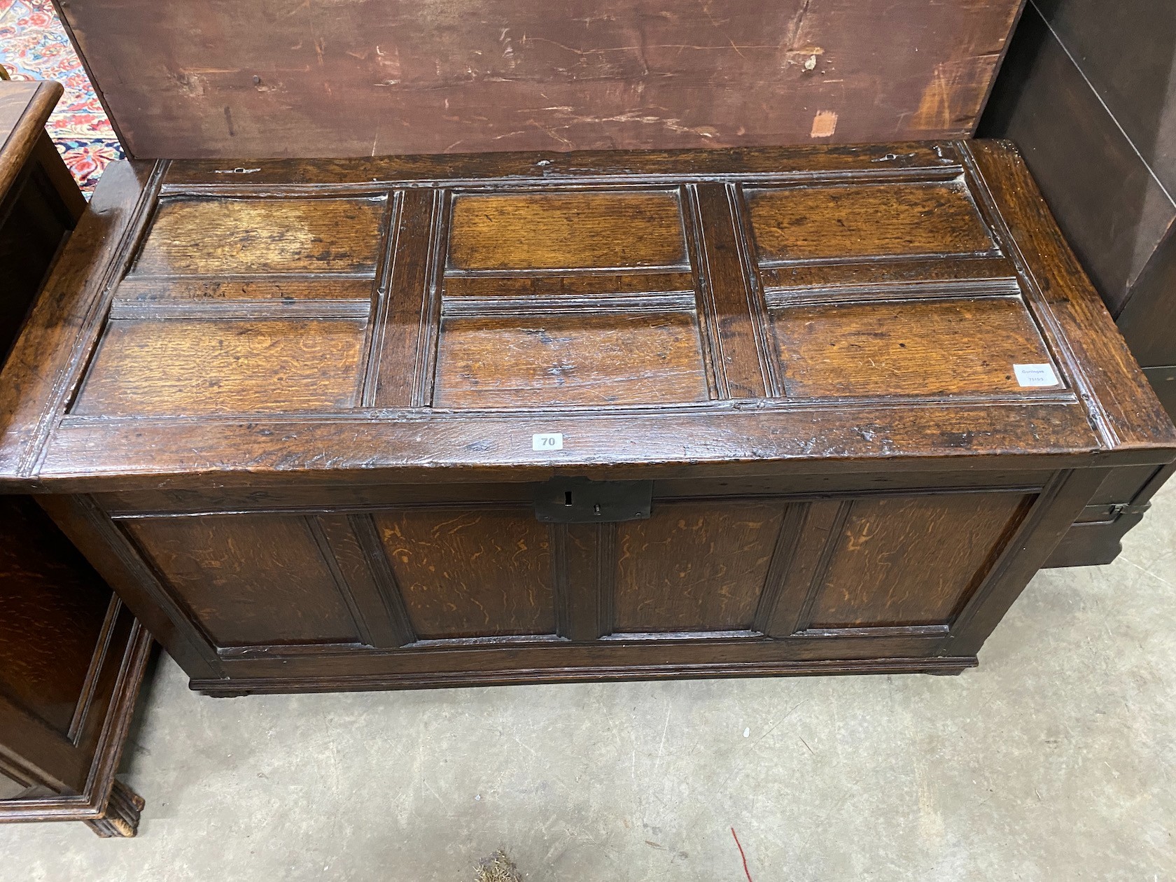 A late 17th century and later country panelled oak coffer, length 126cm, depth 55cm, height 64cm